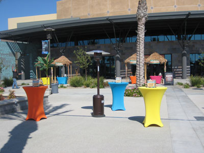 bright colored spandex linens over high cocktail tables