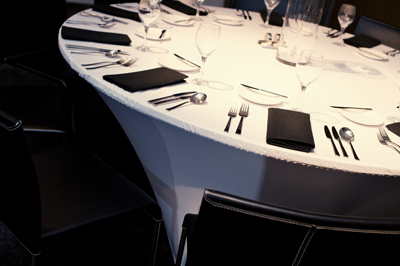 white spandex dinner tables