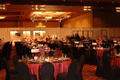 black contour chair covers with red lame tablecloths